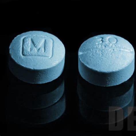what stamps are being used on fake oxycodone pills
